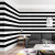 白黒の縦縞の壁紙現代簡単居間の床屋の喫茶店の服装の店のテレービーの背景の壁紙の細い条の版